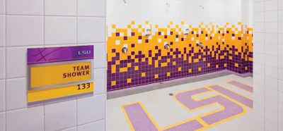 LSU Basketball Practice Facility. A pop of color makes an impact, elevating a team shower beyond its function.