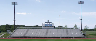 A Texas headphone system with pole-mounted speakers flanking the seating area [Photo courtesy of Community Professional Loudspeakers]
