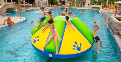 This hill on the water is easy to mount and rewards its climbers with five slide options on the other side. Guests of all ages can ride the tubes or slide down in between for the ultimate cooling-down experience. - Click to enlarge