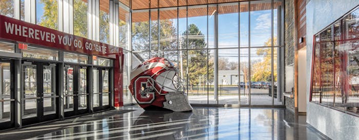 A dramatic hockey goalie mask features prominently in the entryway to Colgate’s new Class of 1965 Arena. [Photos courtesy of Sasaki]
