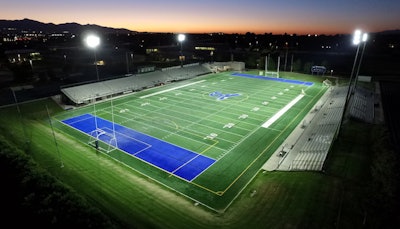 High school football field lit by LED Sports Lighting