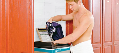 A locker room extractor will remove 95 percent of the water from dripping-wet swimsuits. [Photo courtesy of Extractor Corp.]