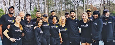 Agape Tennis Academy staff pose for a photo at DeKalb Tennis Center. [Photos courtesy of Agape Tennis Academy]