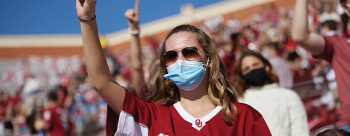 Masked fans at Gaylord Family - Oklahoma Memorial Stadium [Photo courtesy of Travis Caperton, University of Oklahoma]