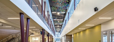 “Family Tree/Community Circle” hanging scultures in SAARC atrium. [Photo by Don Cunningham]