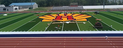 Astroturf installation at Roxana High School. [Image courtesy of YouTube]