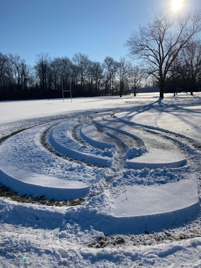 Damage from vehicles spinning 'donuts' on park property.