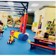 The We Rock the Spectrum Kid’s Gym is an all-inclusive sensory franchise gym founded for children with special needs, but serves all children. At right: Kissimmee location owner Andrea Beasley and her daughter, Mia.