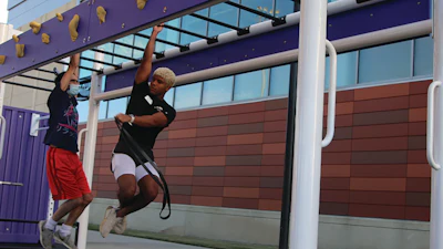 LSU’s new outdoor fitness space offers monkey bars and a slam wall, among other amenities.