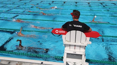 Lifeguard On Chair And Swimmers High Res Cmyk