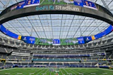 PFEIFER Structures America completed the monumental cable-net-supported ETFE roof for SoFi Stadium in Inglewood, Calif. The roof comprises more than 1,400 tons of double orthogonal grid steel and about 67,000 tons of ETFE membrane, secondary steel, gutters, cross clamps, cable struts and retractable vents.
