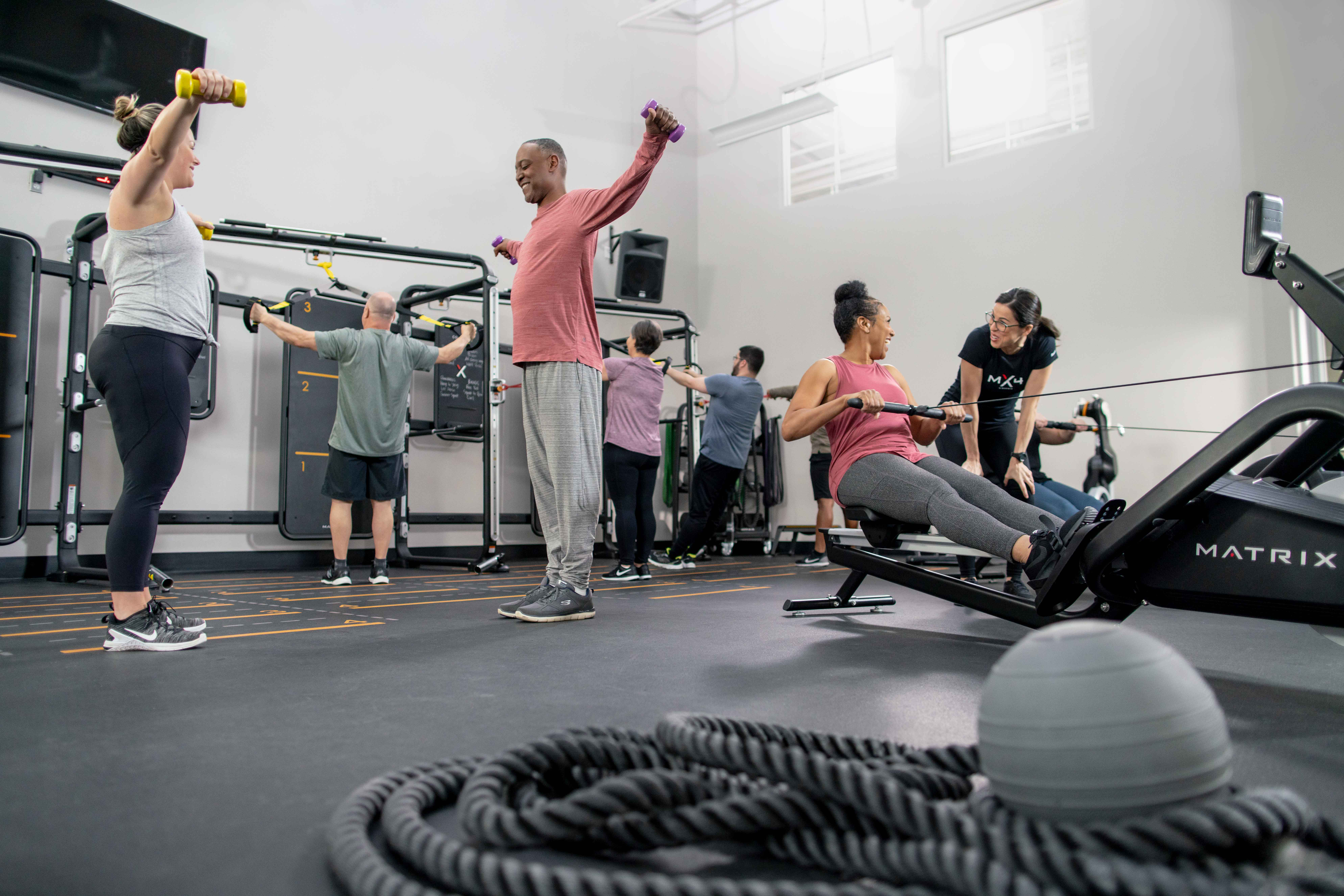 Mx22 Lifestyle Mx420 Active20male Female20lrg20group20workout20weights W Trainer Lo Angle Lores