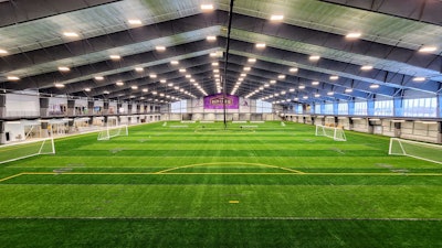 A full indoor soccer and football field with synthetic turf within the CCH Fieldhouse.