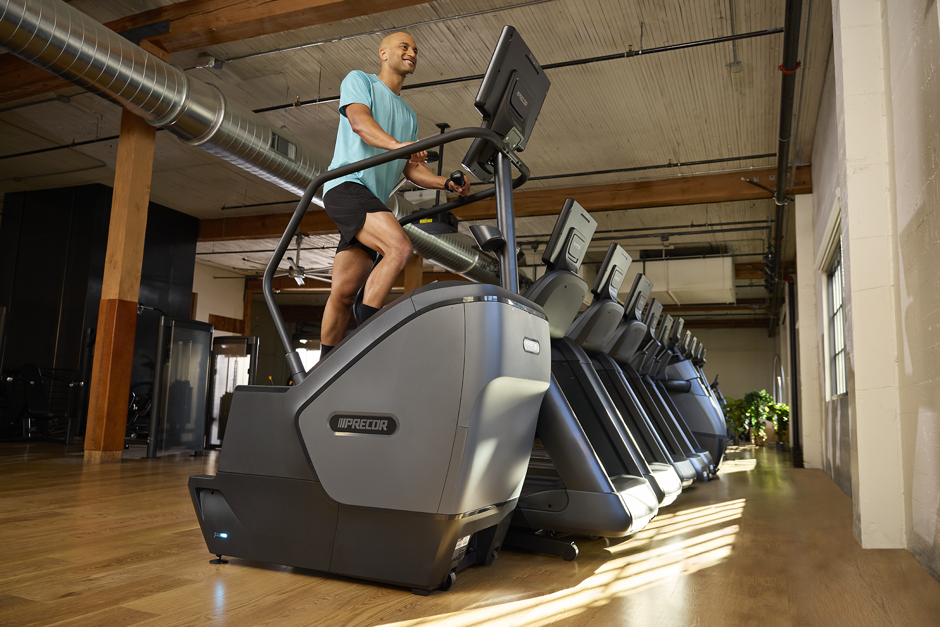 Precor20 Facility Cardio20with20 Focus20on20 Scl20with20 Person20 Working20 Out