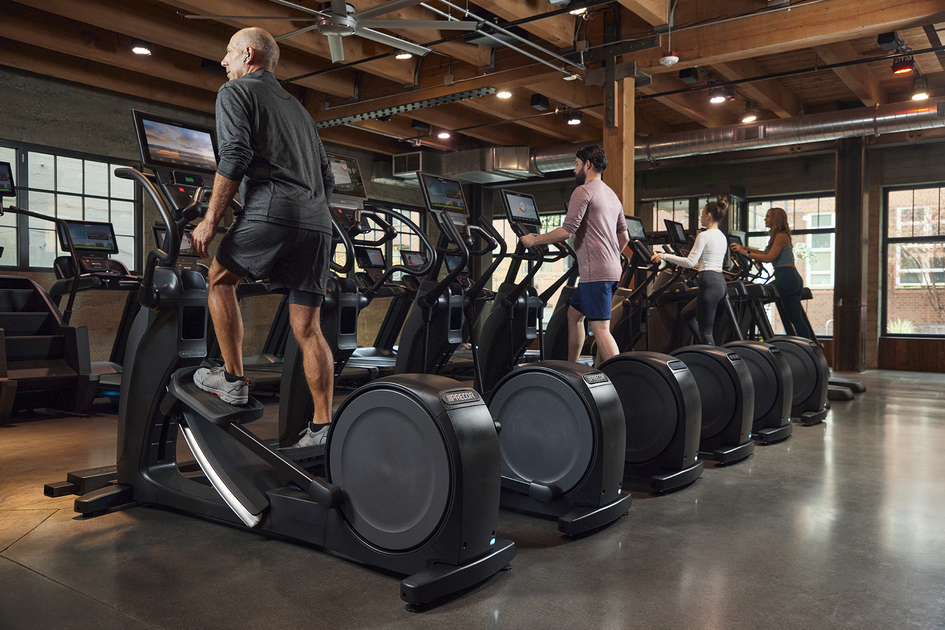Precor20 Facility Row20of20 Efx20with20 People20plus20other20 Precor20 Cardio20with20 P9420 P8420consoles