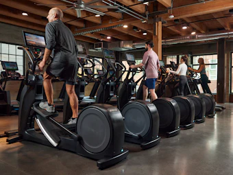 Precor20 Facility Row20of20 Efx20with20 People20plus20other20 Precor20 Cardio20with20 P9420 P8420consoles