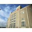 Nebraska Memorial Stadium exterior with arched windows and red N logo