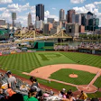 Pittsburgh Pirates baseball game at PNC Park with city skyline and bridges