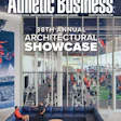 Athletic training facility with glass walls, exercise equipment, and modern lounge seating