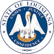 Louisiana state seal featuring white pelican with outstretched wings in golden nest