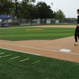 Kalina Hyde, product marketing manager in TenCate’s Sports Division, wears biosensors that track every step, leap and turn on the Pivot® Performance Turf field.