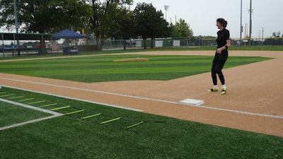 Kalina Hyde, product marketing manager in TenCate’s Sports Division, wears biosensors that track every step, leap and turn on the Pivot® Performance Turf field.
