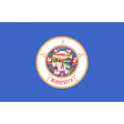 Minnesota state flag featuring colorful official seal on blue background