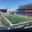 Gillette Stadium filled with fans during a New England Patriots game on a clear day