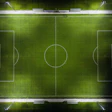 Aerial view of a professional soccer field with white markings, center circle, and goal boxes under stadium lighting