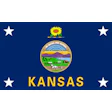 Kansas state flag featuring a navy blue background with white stars and a central seal displaying a sunflower, landscape, and the word KANSAS in gold