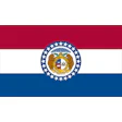 Missouri state seal featuring two bears flanking a shield with stars and official state symbols on red, white, and blue background