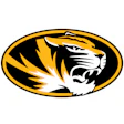 Mizzou Tigers logo featuring a roaring tiger head in gold and white within a black oval badge