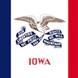 Iowa state flag featuring a bald eagle with outstretched wings holding a banner inscribed with the state motto 'Our Liberties We Prize and Our Rights We Will Maintain'