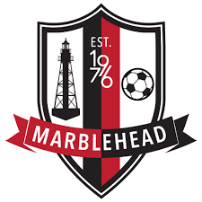 Marblehead soccer club logo featuring shield crest with oil derrick, soccer ball, and established 1976 banner