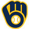 Milwaukee Brewers logo featuring a navy blue baseball glove with gold outline and white baseball
