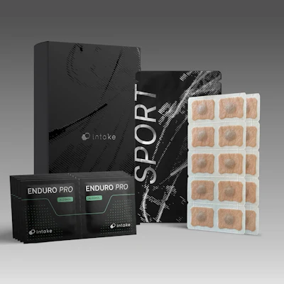 Intake Enduro Pro sport supplement product set with black packaging boxes and tan-colored sachets displayed