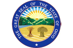 Great Seal of the State of Ohio featuring a circular blue border with gold text, central landscape with rising sun, mountains, and wheat sheaf