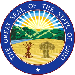 Great Seal of the State of Ohio featuring a circular blue border with gold text, central landscape with rising sun, mountains, and wheat sheaf
